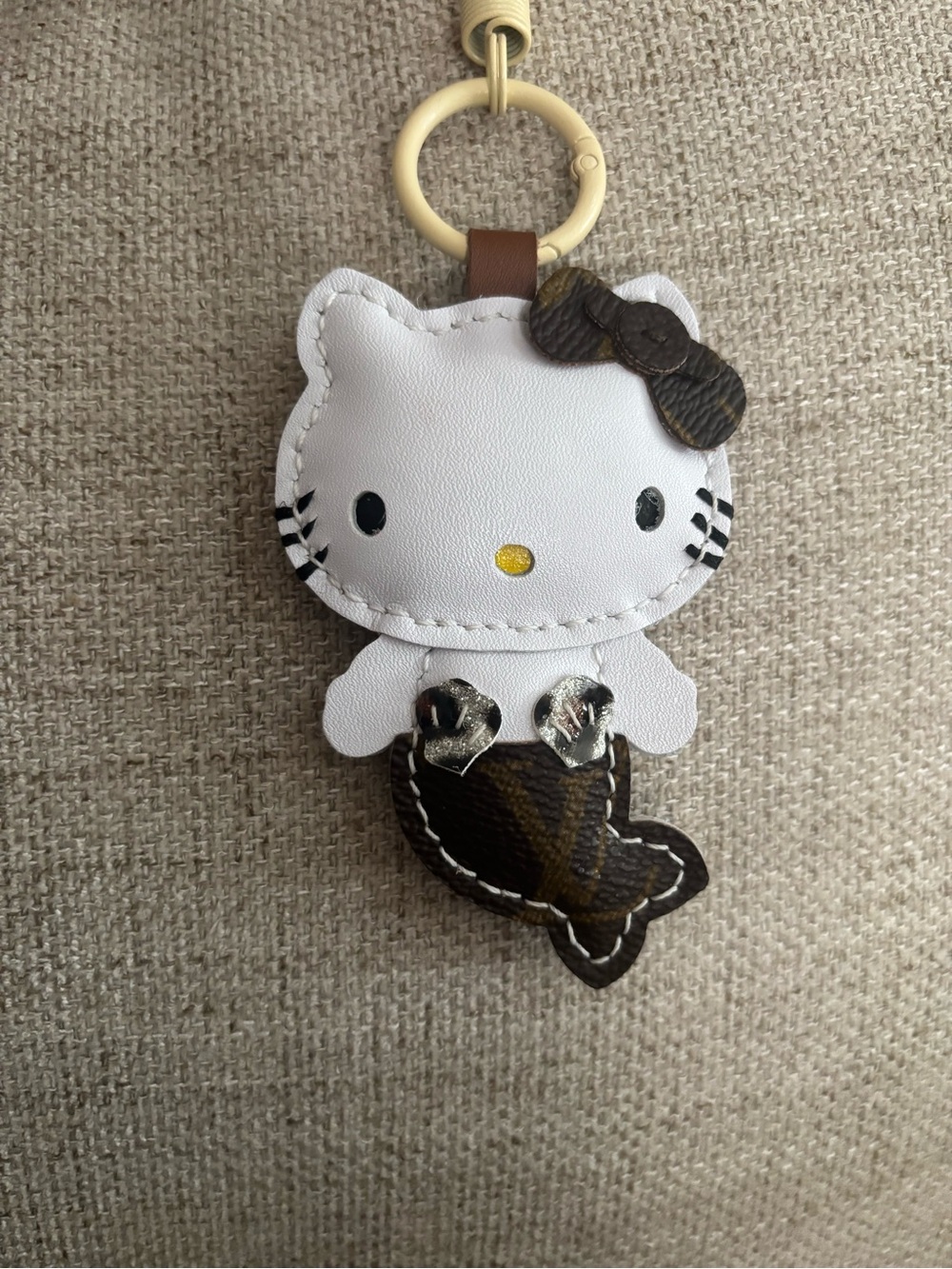 Upcycle hello kitty mermaid charm in monogram logo